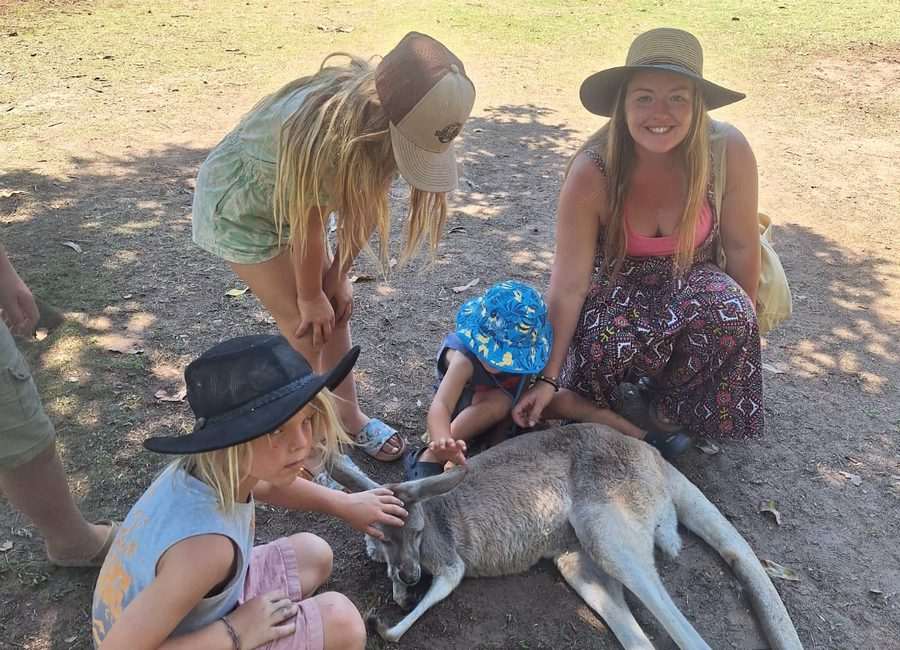 Children observing kangaroo